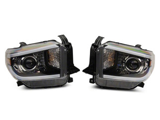 Raxiom 14-21 Toyota Tundra Axial Projector Headlights w/ SEQL LED Bar- Black Housing (Clear Lens)