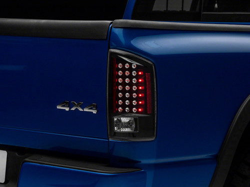 Raxiom 07-08 Dodge RAM 1500 LED Tail Lights- Black Housing (Clear Lens)