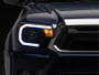 Raxiom 12-15 Toyota Tacoma Axial Series Headlights/Seq LED Bar- Black- Clear Lens
