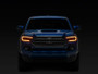 Raxiom 16-23 Toyota Tacoma CXR Series V2 LED Projector Headlights- Black Housing- Clear Lens