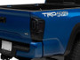 Raxiom 16-23 Toyota Tacoma XW Series Sequential LED Tail Lights- Black Housing/ Smoked Lens