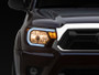 Raxiom 12-15 Toyota Tacoma Axial Series Headlights w/ LED Bar- Black Housing (Clear Lens)