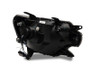 Raxiom 12-15 Toyota Tacoma Axial Series Projector Headlights w/ LED Bar- Black Housing (Clear Lens)