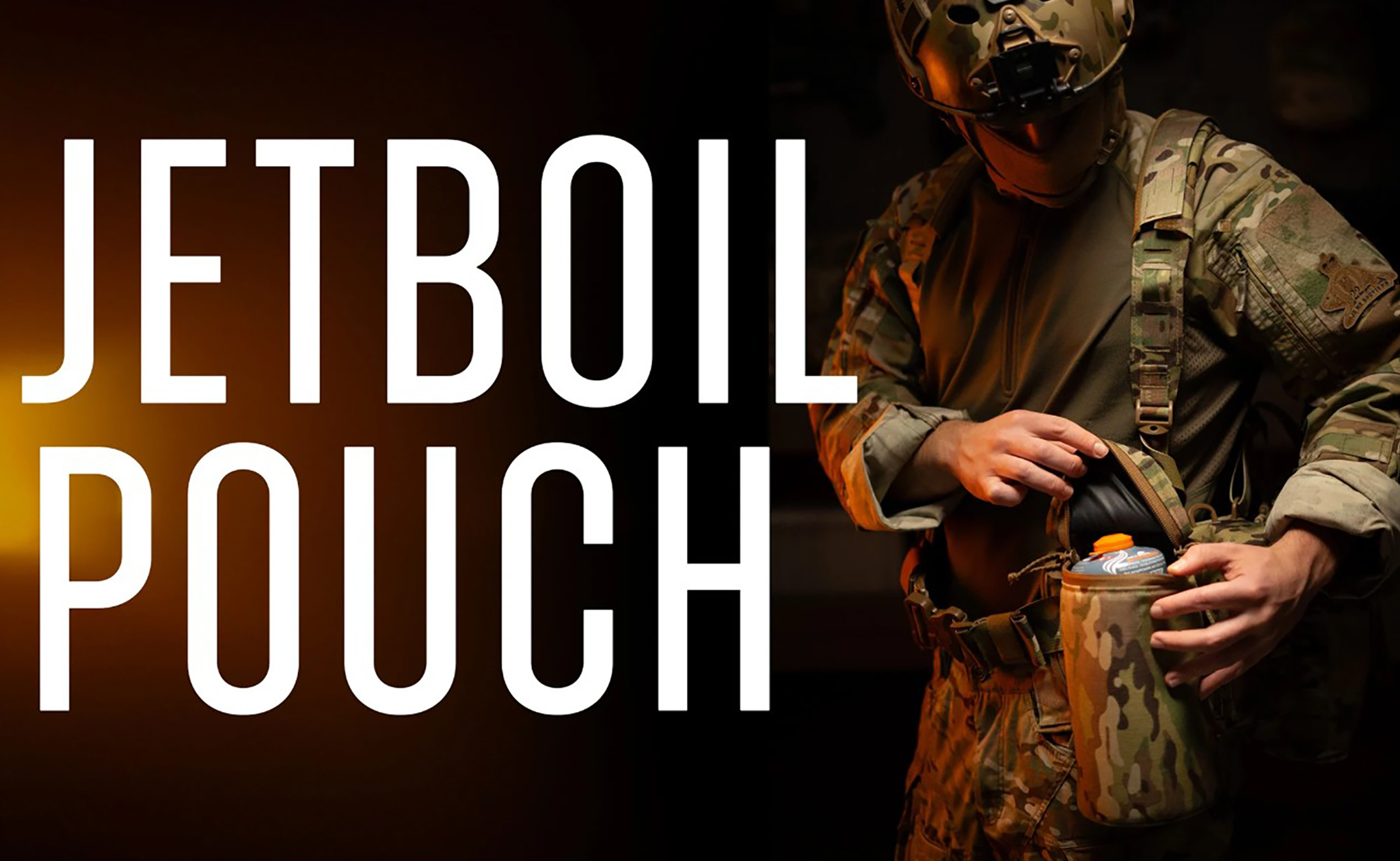 Soldier wearing tactical gear demonstrating the Carcajou Tactical Jet Boil Pouch attached to a belt, with the text “Jetboil Pouch” displayed on the left, available at Hudson Supplies Corp.