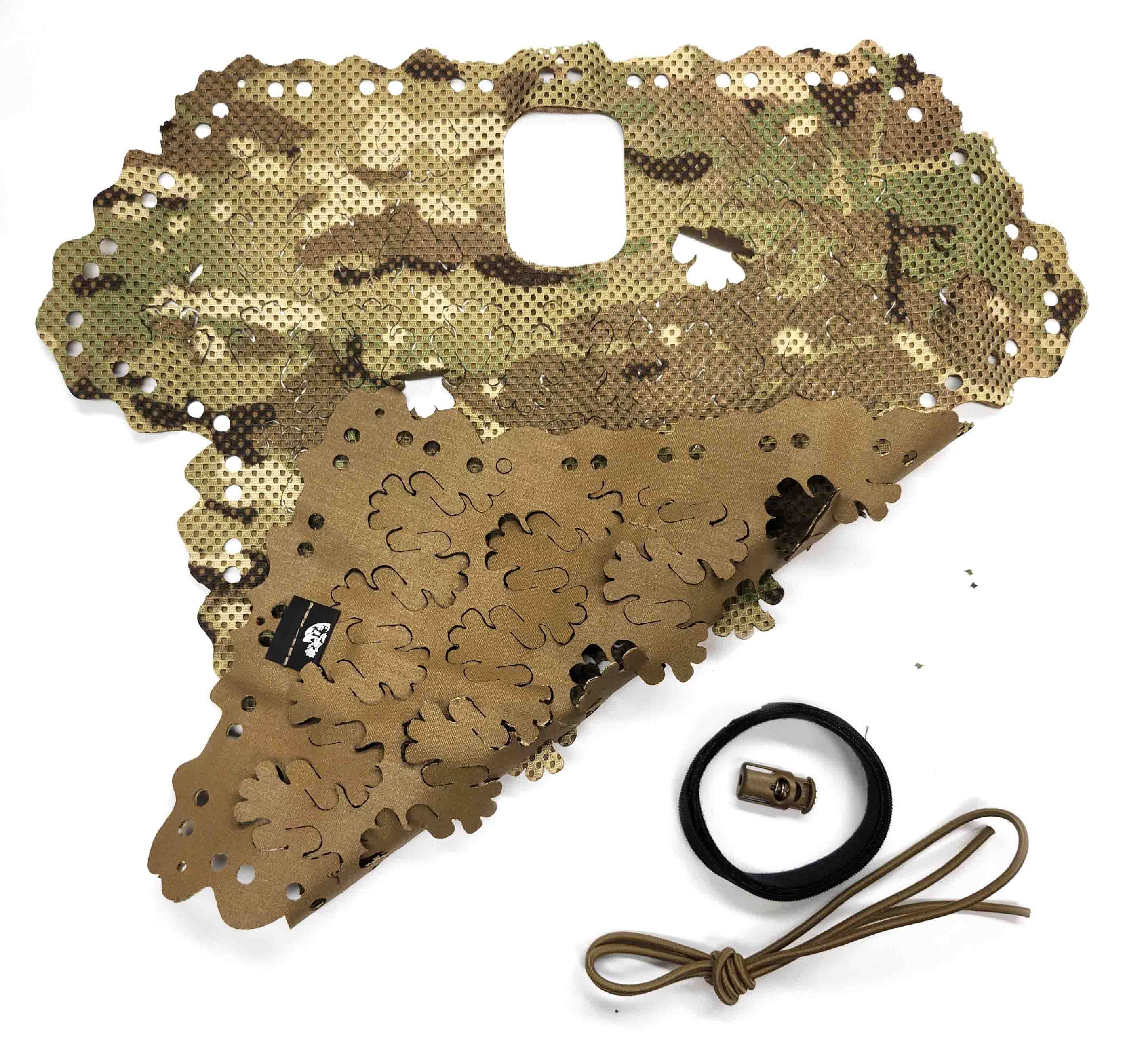 Carcajou Tactical helmet scrim laid flat showing both sides in Multcam with included bungee cord and ITW cord lock