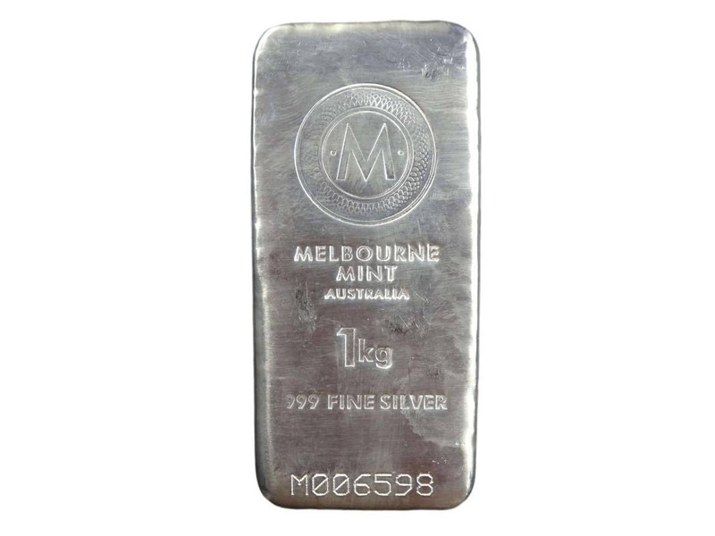 Melbourne Mint Australia 1 Kg 999 Fine Silver Cast Bullion Bar, silver bar with engraved Melbourne Mint logo, weight, purity, and serial number.