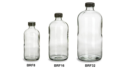 Pair of Large Spherical Clear Glass Bottles