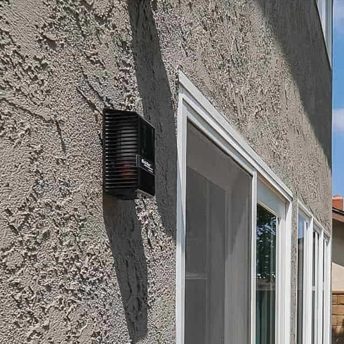 Bird-Out installed on the backyard entrance of a house