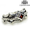 silver medieval engagement ring with garnet stone