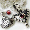 medieval fairy tale silver studded heart necklace with garnet detail