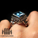 ladies silver gothic wedding ring with blue topaz stone for goth girls