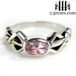silver friendship ring with pink cz stone
