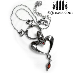 .925 sterling silver heart necklace with garnet stones