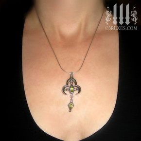 moorish marquise silver cross necklace with green peridot stones renaissance gothic medieval jewelry model wearing 16" silver snake chain