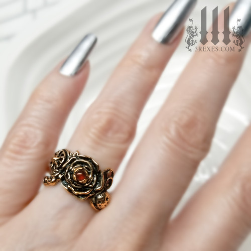 bronze full moon ring , rose ring, flower ring, sun ring with green peridot stone, gothic jewelry, fantasy designs, model view, august birthstone ring