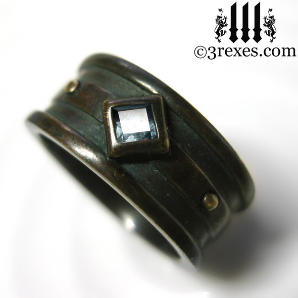 dark brass moorish gothic ring with blue topaz