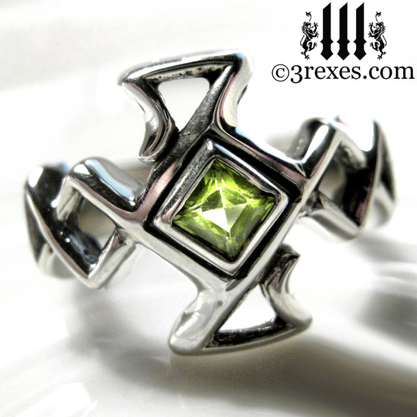 .925 sterling silver celtic cross ring with green peridot stone