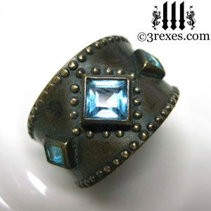 brass-3-wishes-ring-front-blue-topaz-stone-medieval-gothic-wedding-jewelry-december-birthstone