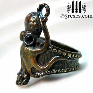 octopus dream ring dark brass black onyx stone eyes gothic studded band side detail