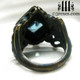 raven love brass wedding ring with large blue topaz stone back detail