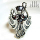 silver octopus ring with garnet cabochon eyes .925 sterling steampunk steam punk jewelry 3 rexes