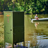 Texas Hunter fish feeder on lake shoreline