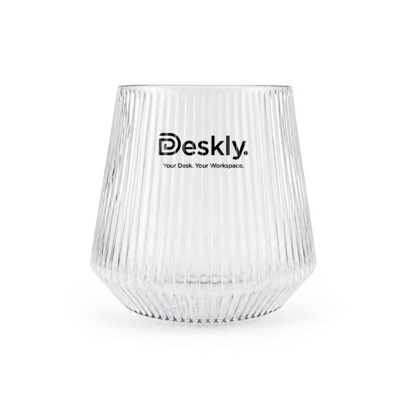 A clear glass tumbler with ribbed texture and a logo at the front.