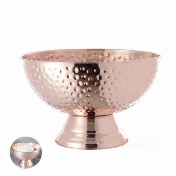A copper bowl with a hammered texture, featuring a rounded shape and a pedestal base.