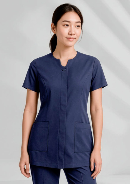 A navy blue women's tunic featuring a round neckline and two front pockets, with an accompanying logo.