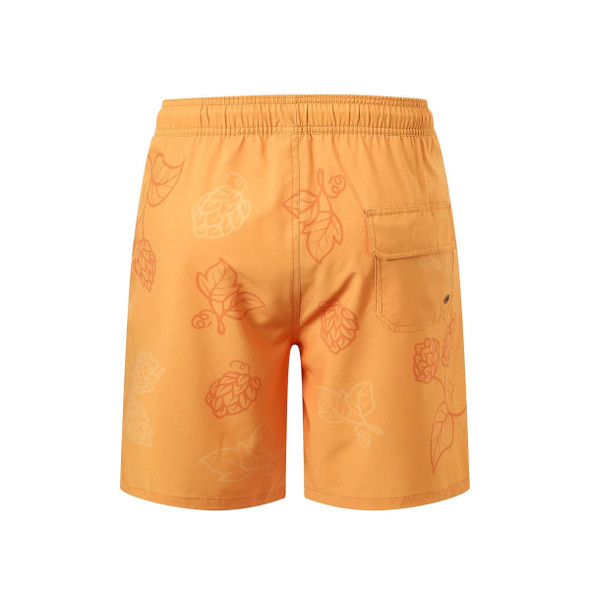 Men's orange polyester spandex swim shorts with a leaf pattern and a back pocket, featuring a logo.