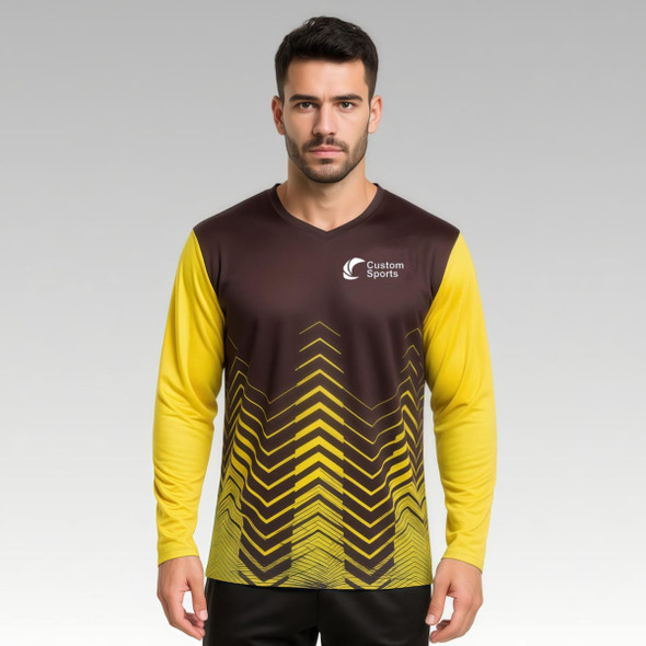 A men's unisex long sleeve shirt featuring a yellow and brown sublimated design with a logo.
