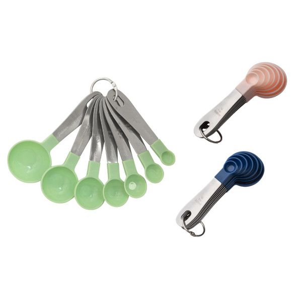 A set of measuring spoons in green and grey, featuring a metal ring, alongside nested spoons in pink and blue.