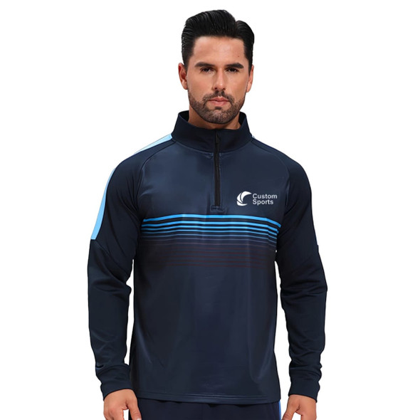 A navy blue polyester spandex quarter-zip raglan jacket with light blue stripes and a logo. A navy blue polyester spandex quarter-zip raglan jacket with light blue stripes and a logo.