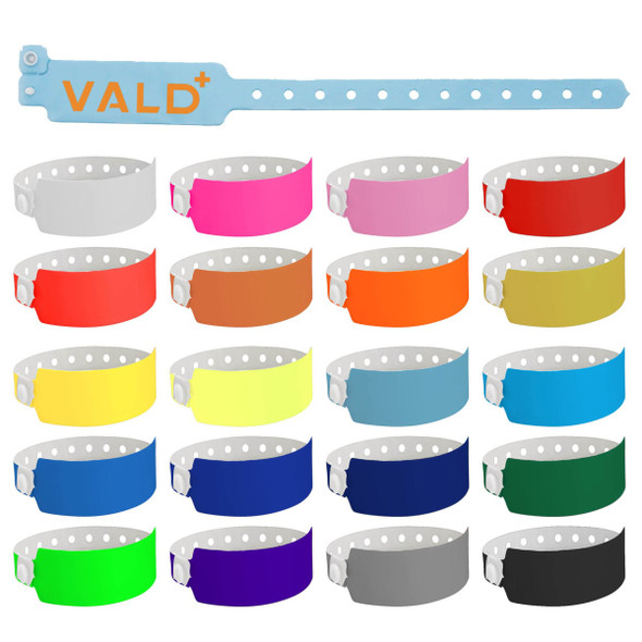 A selection of 25mm vinyl wristbands in various colours, featuring a logo on one of the bands.