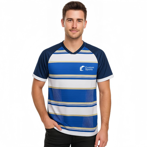 A man wearing a blue and white striped V-neck raglan tee shirt with a logo on the front.