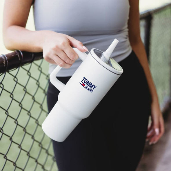 A drink bottle in white with a handle and a straw, featuring a logo on the front.