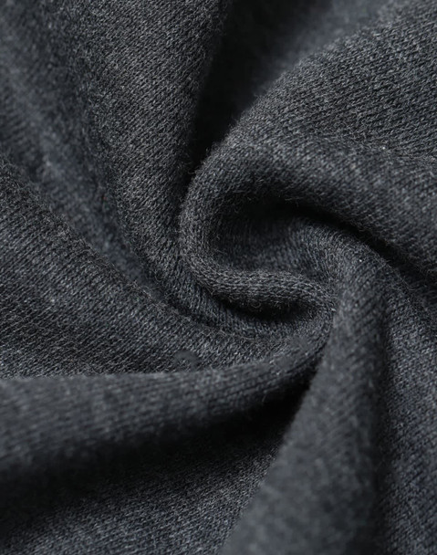 A close-up of dark grey fabric showcasing a soft, fleecy texture with a slight swirl pattern.