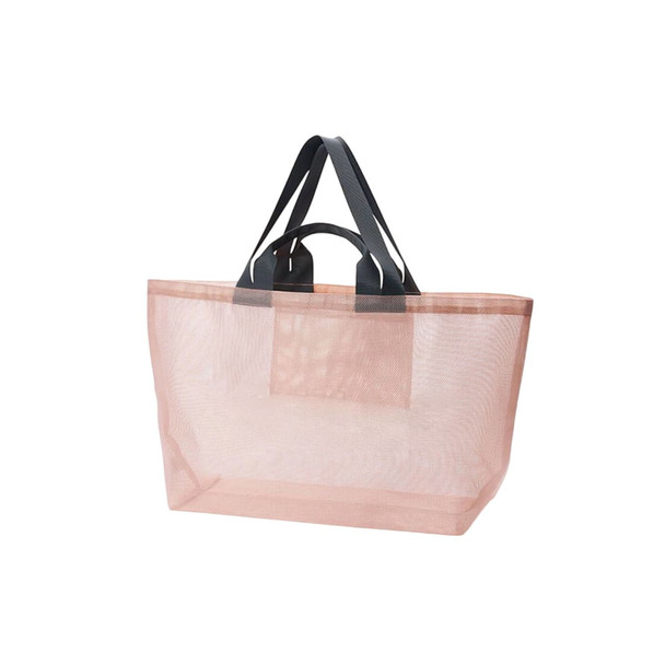 A large mesh beach tote bag in soft pink with dark grey handles, featuring a simple design and a logo.