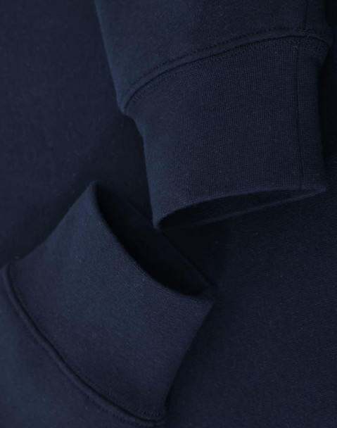 A navy crewneck sweatshirt featuring folded cuffs and a simple design, with a logo present.