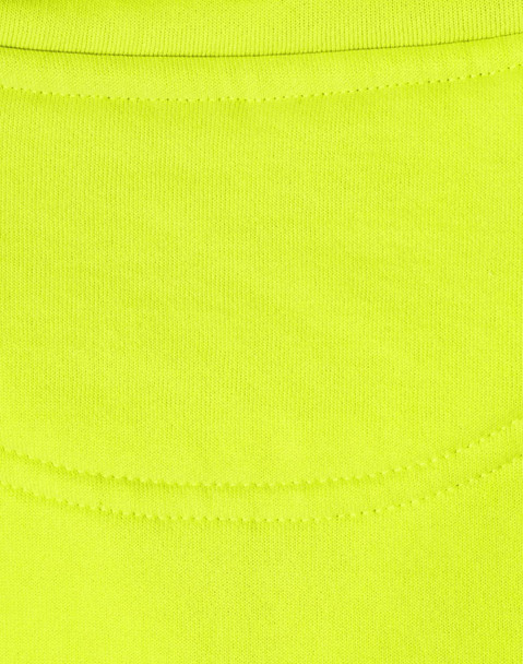 A bright high-visibility yellow work jumper featuring a smooth fabric texture and a logo.