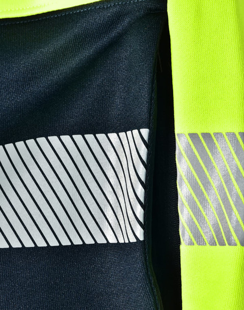 A navy jumper with reflective stripes and high visibility yellow accents, featuring a logo.