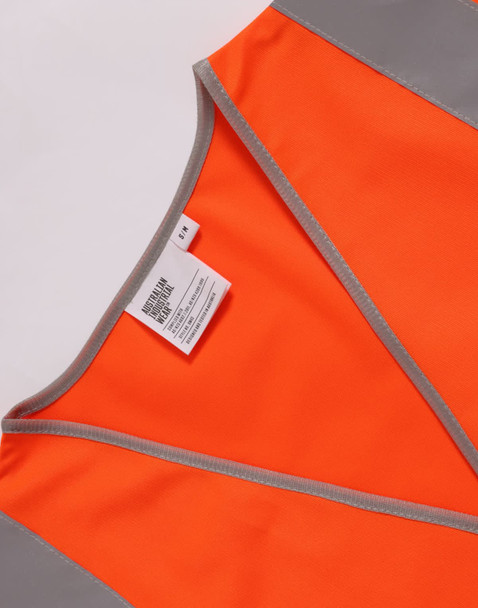 An orange safety vest featuring grey shoulder reflective tapes and a tag inside.