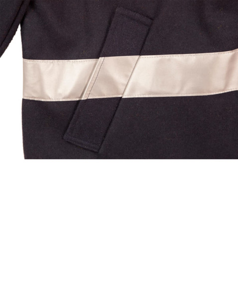 A blue safety jacket featuring reflective 3M tape, designed for visibility in work environments.