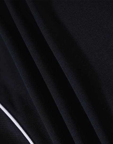 A close-up of a black polo shirt fabric, featuring a smooth texture and white detailing. The shirt has a logo.