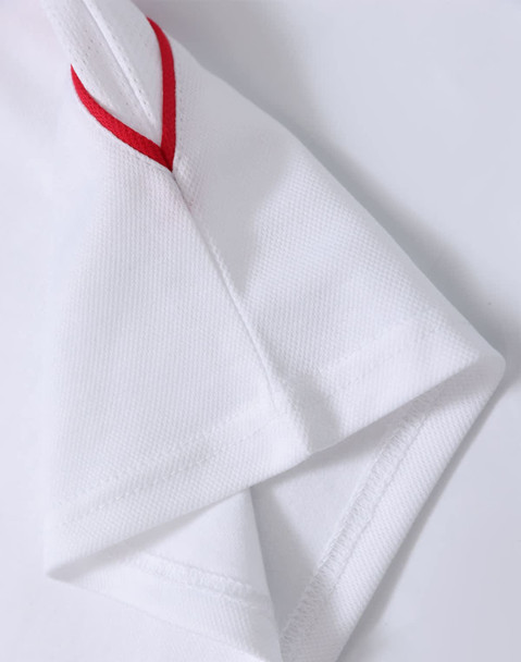 A white polo shirt featuring red detailing on the sleeves, with a branded logo.