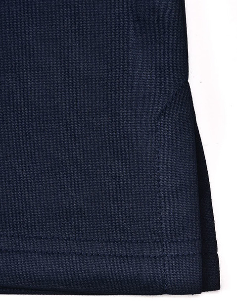 A navy polo shirt featuring a side vent detail and a logo on the fabric.