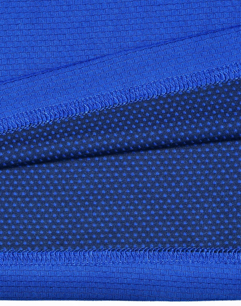 A close-up of blue bamboo charcoal fabric with textured patterns and a visible logo.