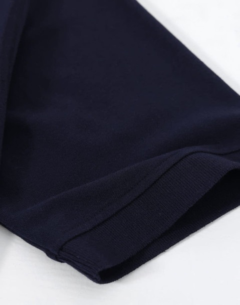 A navy cotton stretch polo shirt, displaying the sleeve cuff and fabric texture, with a branding logo.