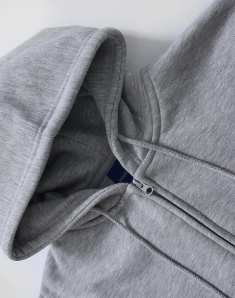 A grey men's full-zip fleecy hoodie with a hood and zippered front. It features a branding logo.