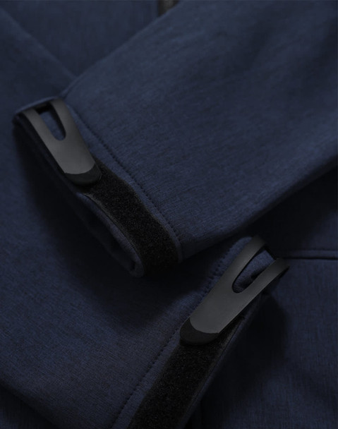 A close-up of a navy softshell hoodie featuring cuff details and a logo.